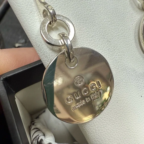 GUCCI Signature Sterling Silver medallion Drop Earrings